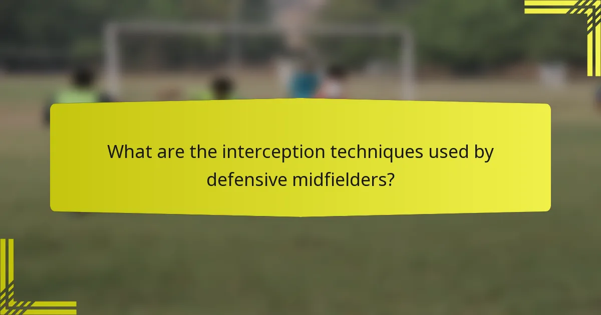 What are the interception techniques used by defensive midfielders?